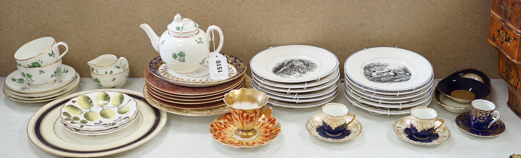 A Spode ‘tulip’ cup and saucer, a set of Sarreguemines month plates and collection of Worcester